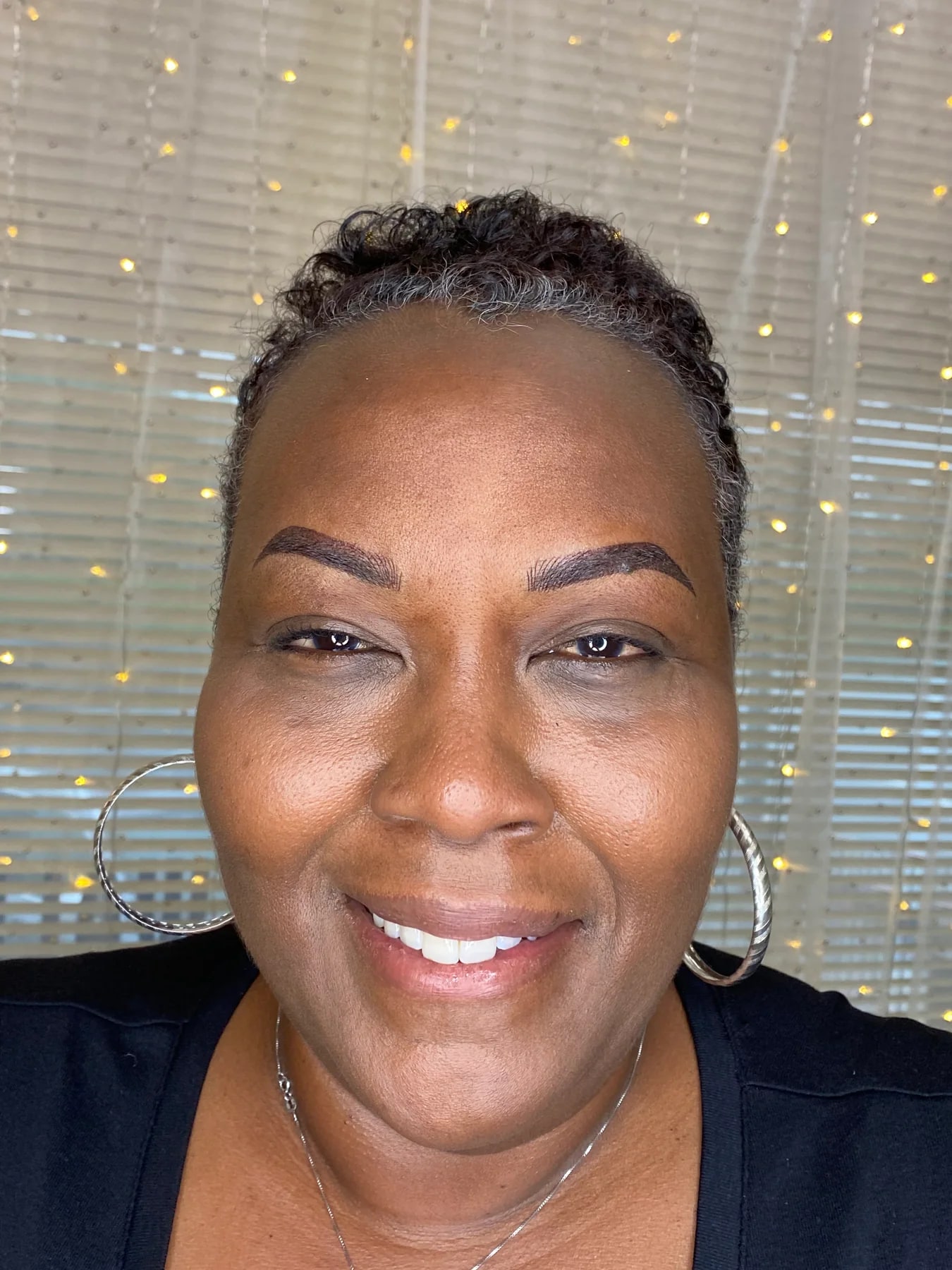 Full-face view of groomed brows