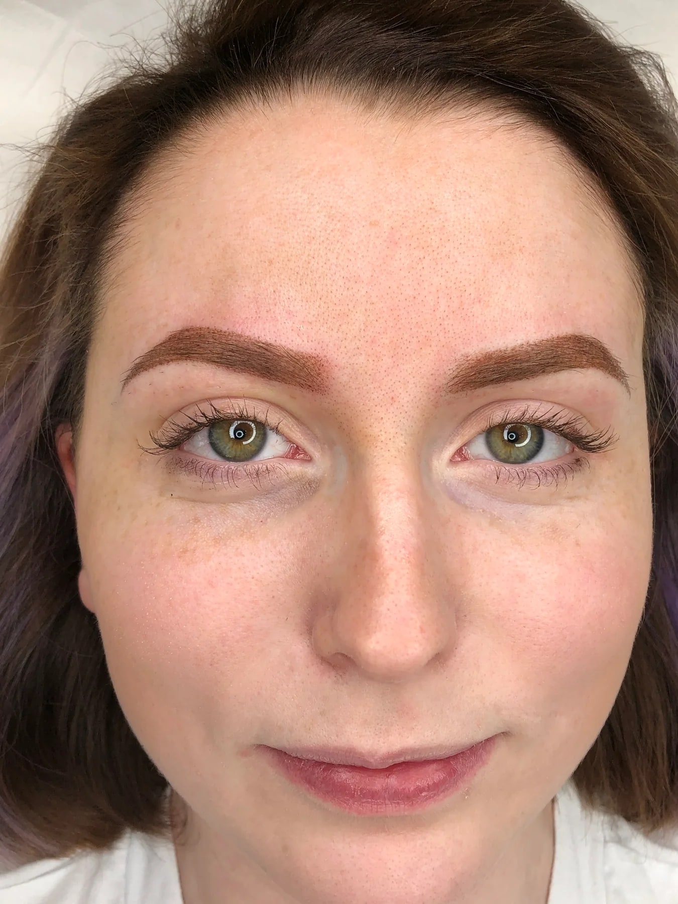 Clean brow finish in close-up